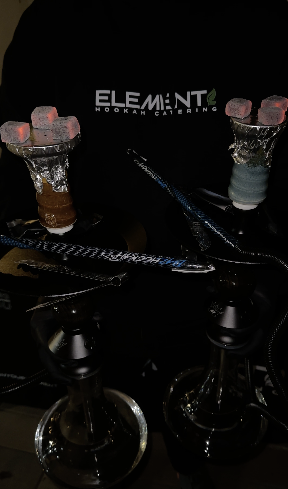 Dual hookah setup with Element branded backdrop.